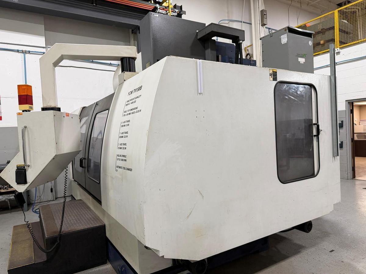 Used YCM TV158B CNC VERTICAL MACHINING CENTER