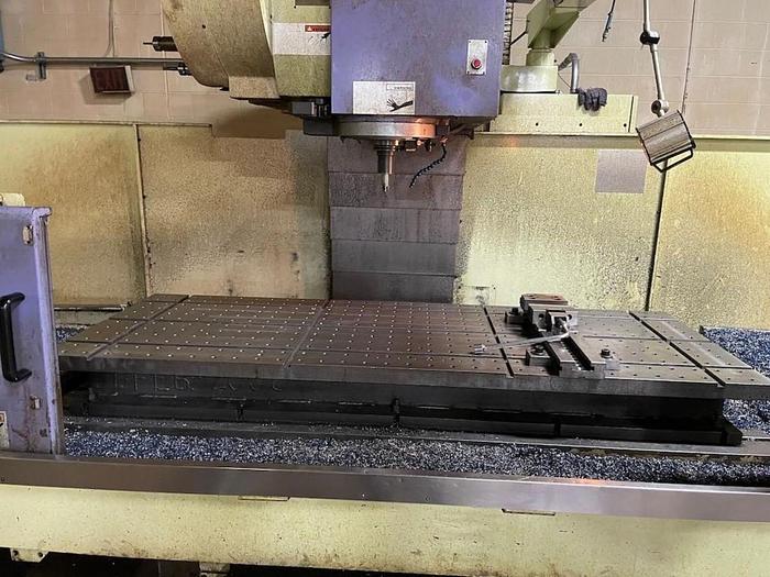 Used TAKUMI V22A VERTICAL MACHINING CENTER