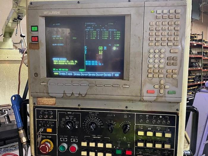 Used TAKUMI V22A VERTICAL MACHINING CENTER