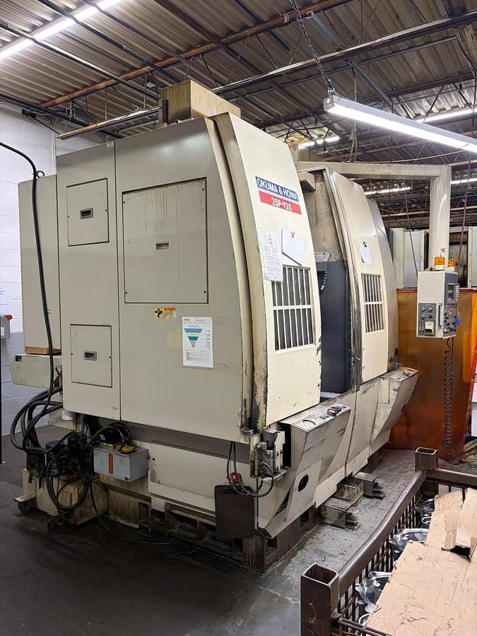 Used OKUMA & HOWA 2SP-V35 CNC TWIN-SPINDLE VERTICAL TURNING CENTER