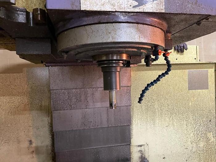 Used TAKUMI V22A VERTICAL MACHINING CENTER