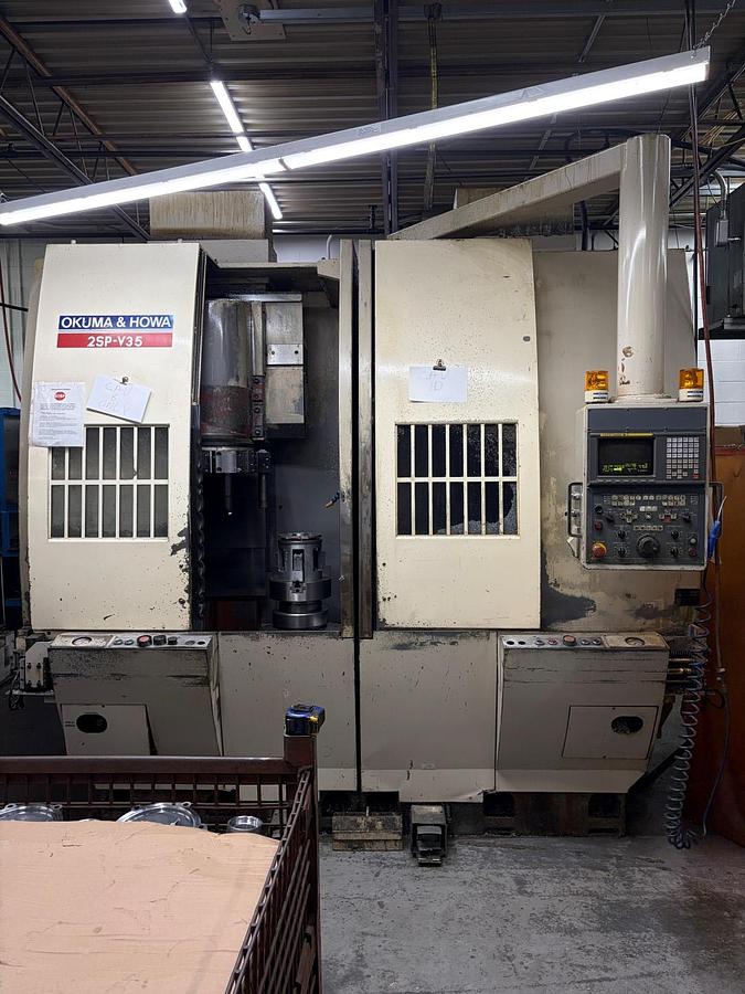 Used OKUMA & HOWA 2SP-V35 CNC TWIN-SPINDLE VERTICAL TURNING CENTER