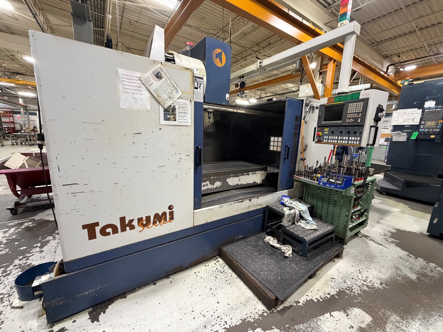 Used TAKUMI V15 VERTICAL MACHINING CENTER