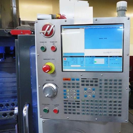 Used HAAS VF2YT 2012 VERTICAL MACHINING CENTER