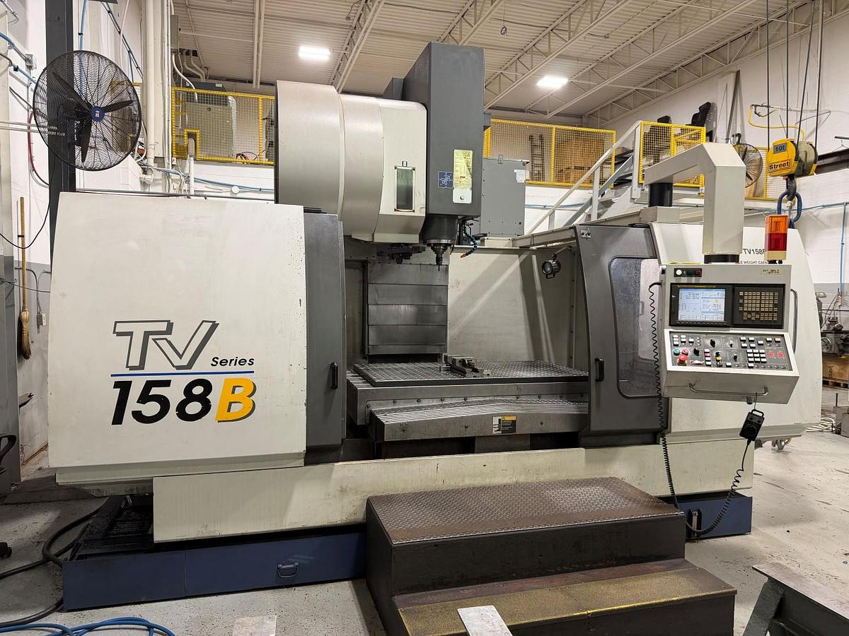 Used YCM TV158B CNC VERTICAL MACHINING CENTER