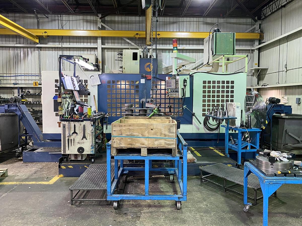 Used TAKUMI V22 VERTICAL MACHINING CENTER