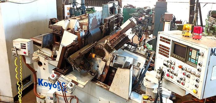 Used Koyo KC-500A (8-axis) CNC Centerless Grinder