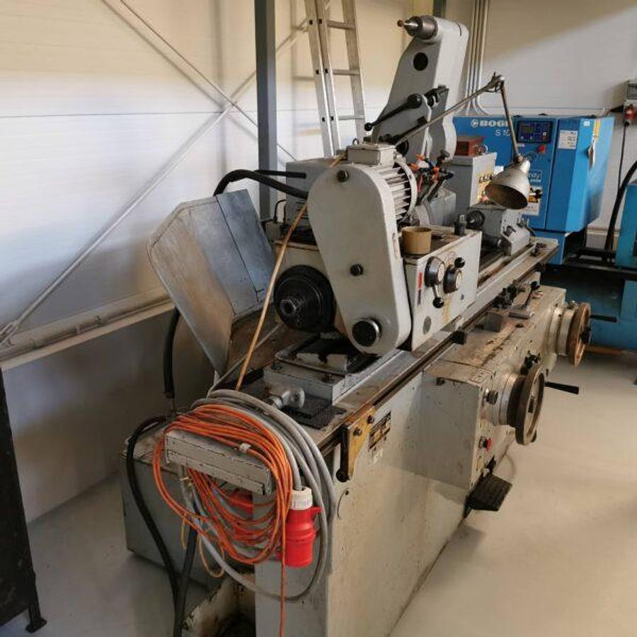 Used SZIM KU250-04-750 cylindrical grinding machine