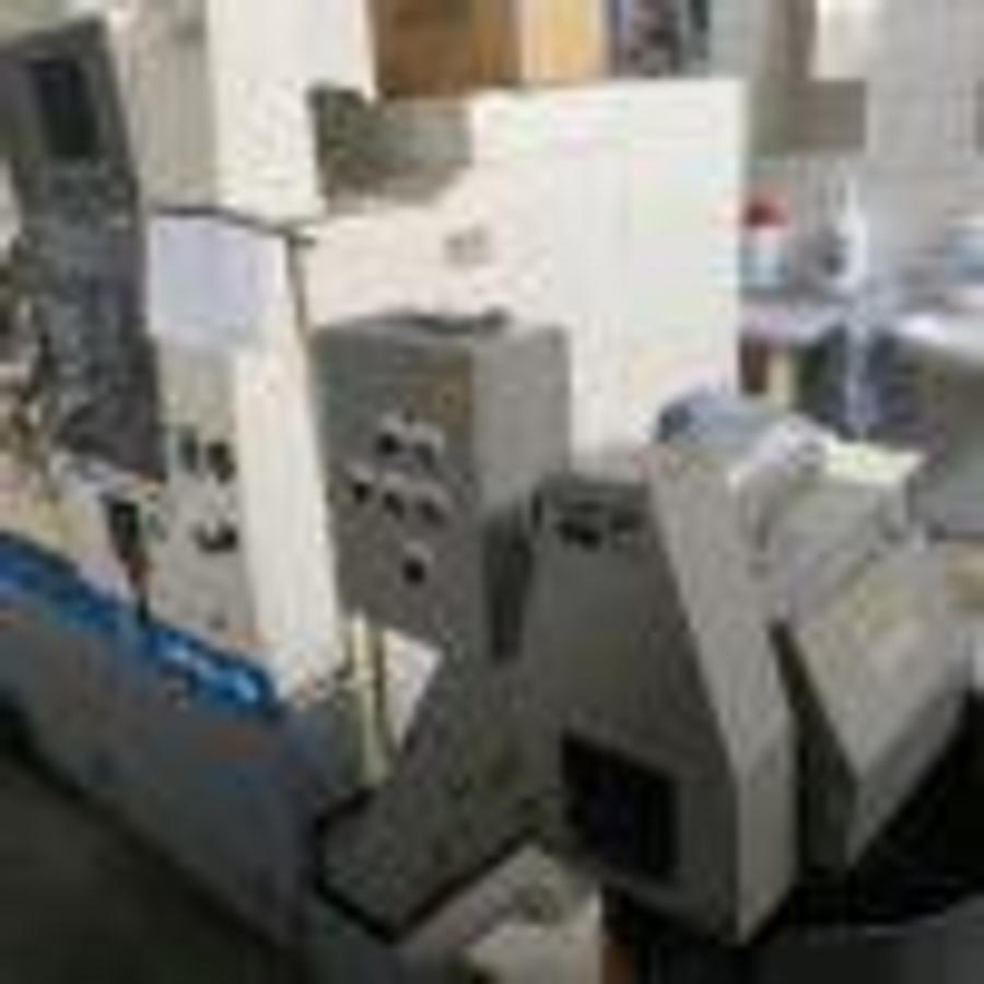 Used OKUMA LB10-M cnc lathe
