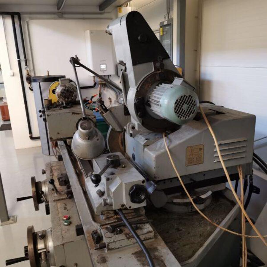 Used SZIM KU250-04-750 cylindrical grinding machine