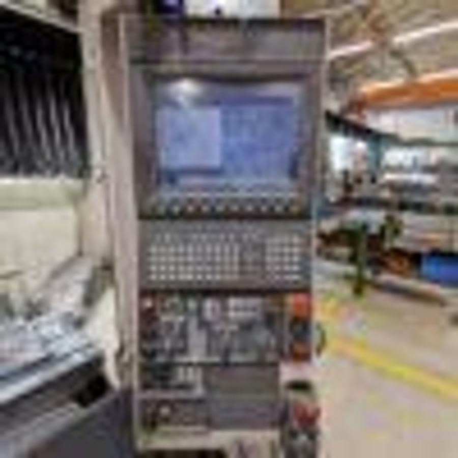 Used OKUMA MB46-VAE machining center