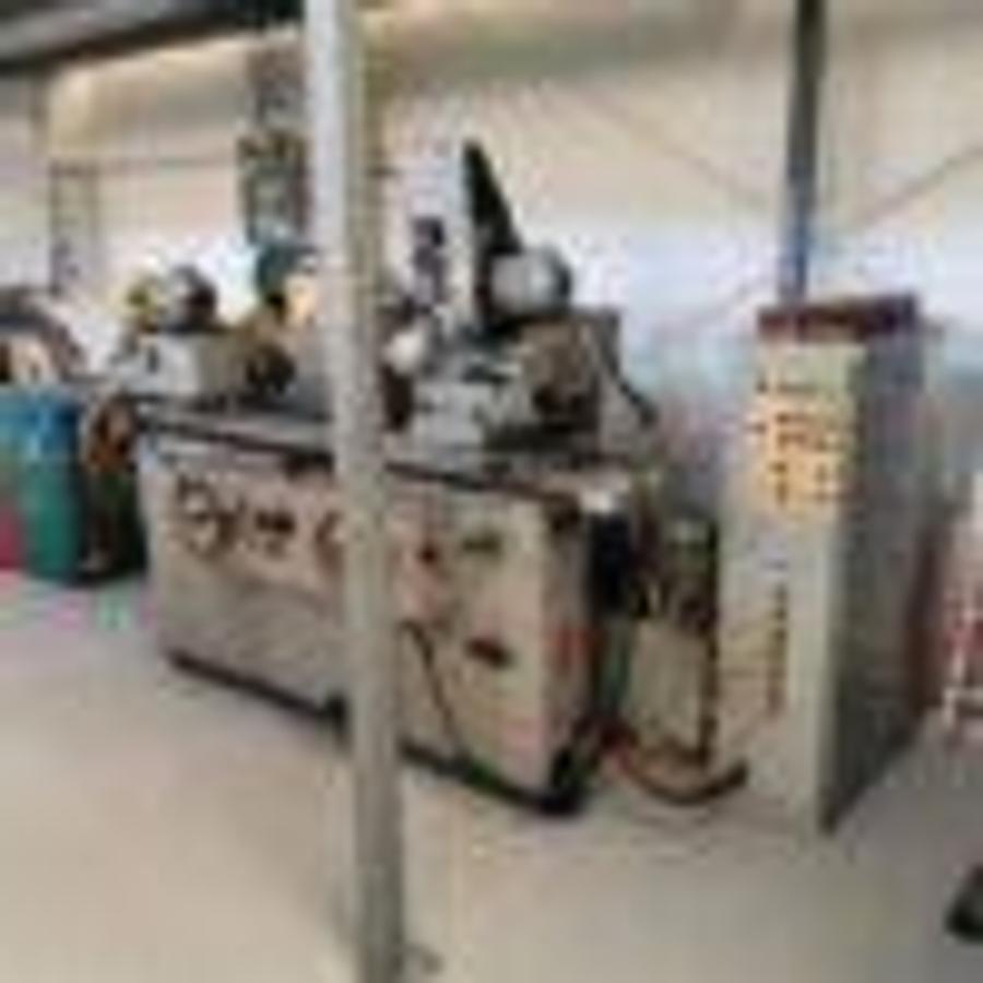 Used SZIM KU250-04-750 cylindrical grinding machine