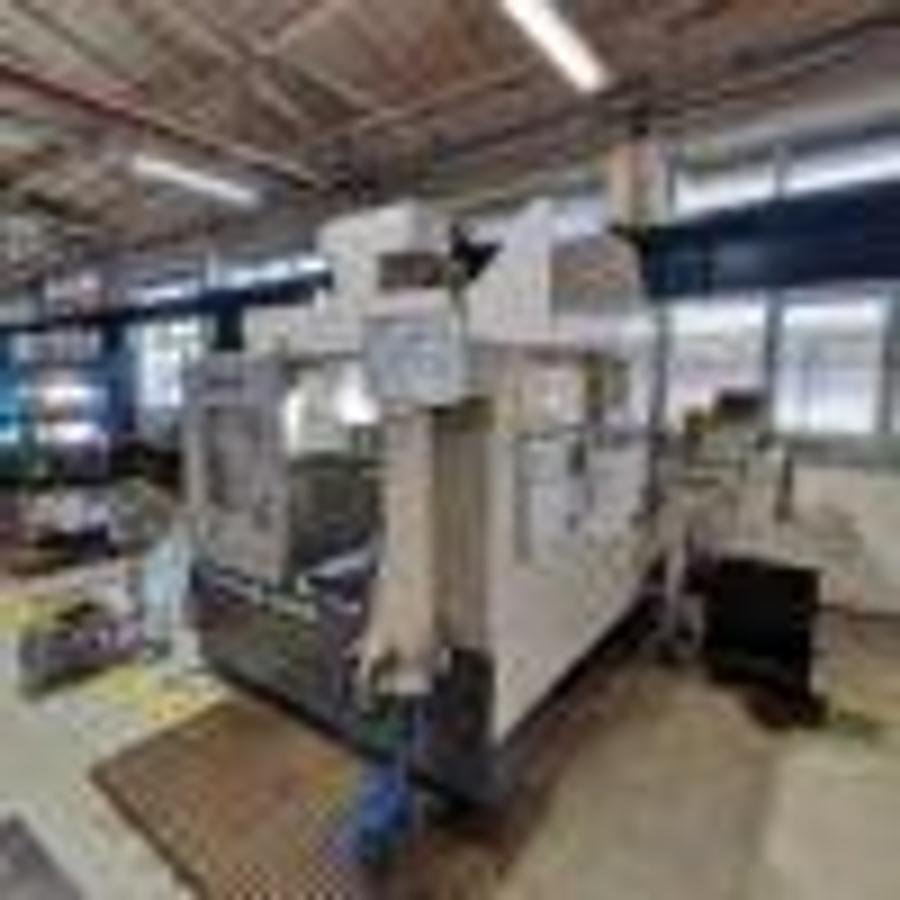 Used OKUMA MB46-VAE machining center