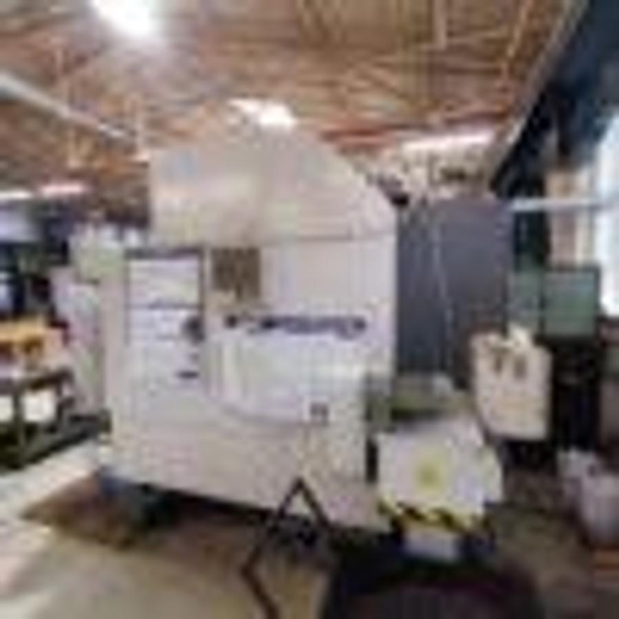 Used OKUMA MB46-VAE machining center