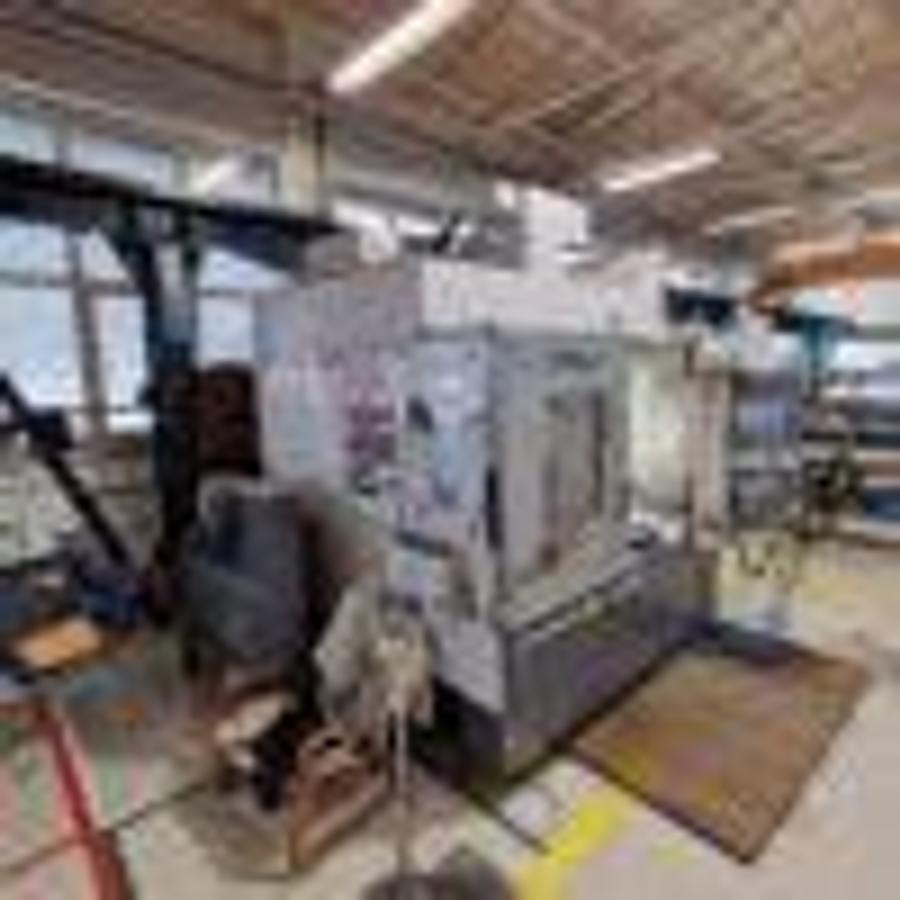 Used OKUMA MB46-VAE machining center