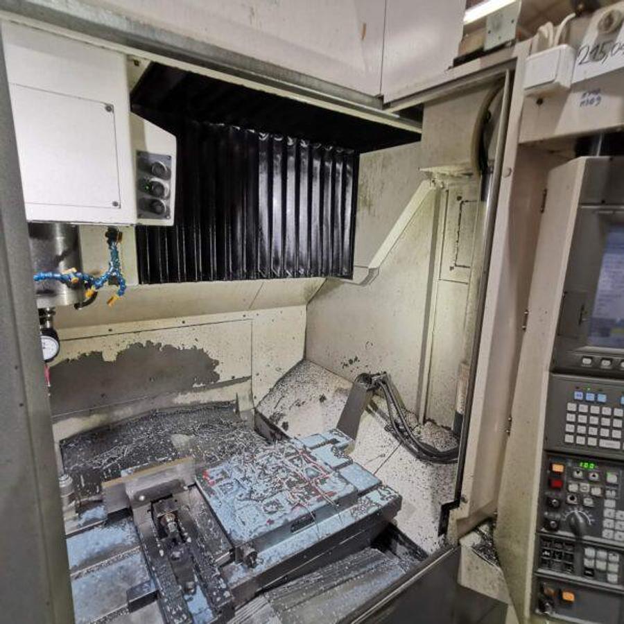 Used OKUMA MB46-VAE machining center