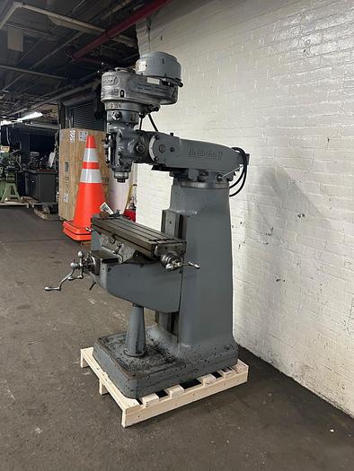 Used Bridgeport 9" x 32" 1 HP, 8-Speed Ram Type J-Head Vertical Milling Machine & R8 Collets