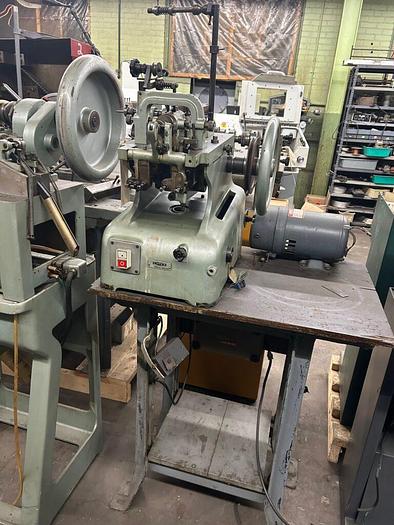 Used 8105-100 OMBI Medium Double Curb Chain Making Machine, S/N 4984