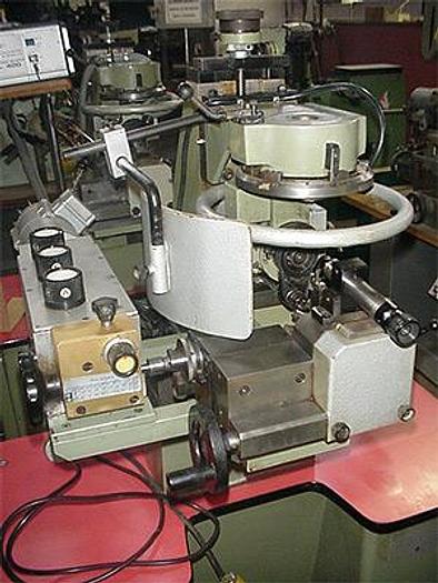 Used 6950-110 Tousdiamants T4-DTG Swiss Diamond Cutting Machine with Semi-Automatic Ring Divider