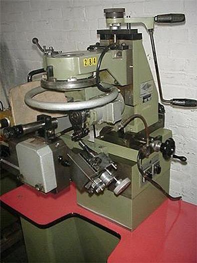 Used 6950-110 Tousdiamants T4-DTG Swiss Diamond Cutting Machine with Semi-Automatic Ring Divider