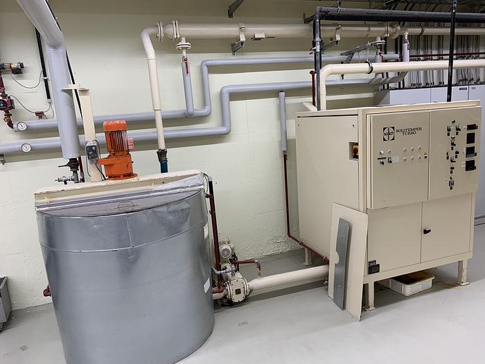 Used Agitator tank with approx. 1,000 kg content in stainless steel design.