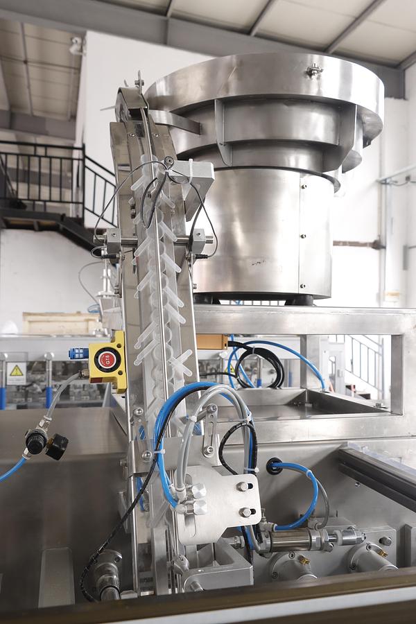 Automatic Scoop Feeder for Pre-made Pouch Packaging Machine