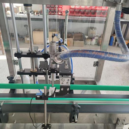 Single head magnetic pump filling machine