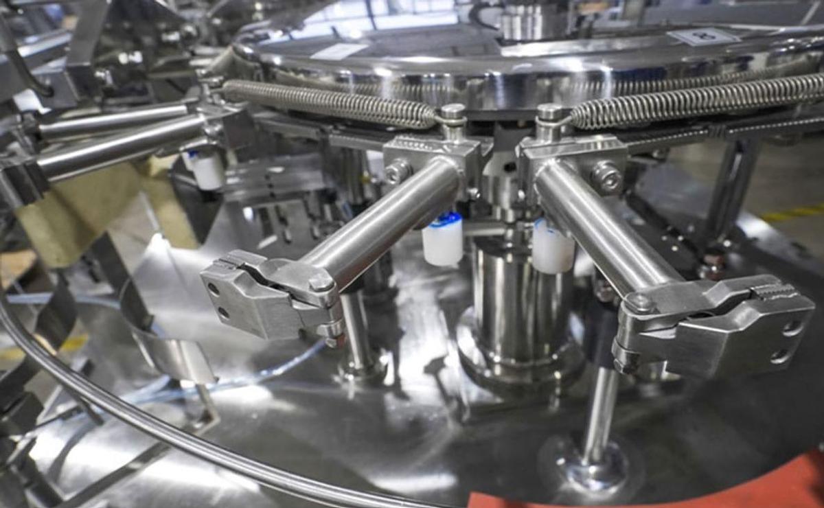 Rotary Packaging Machine with Four-Head Linear Weigher (240E+LW4H3L)