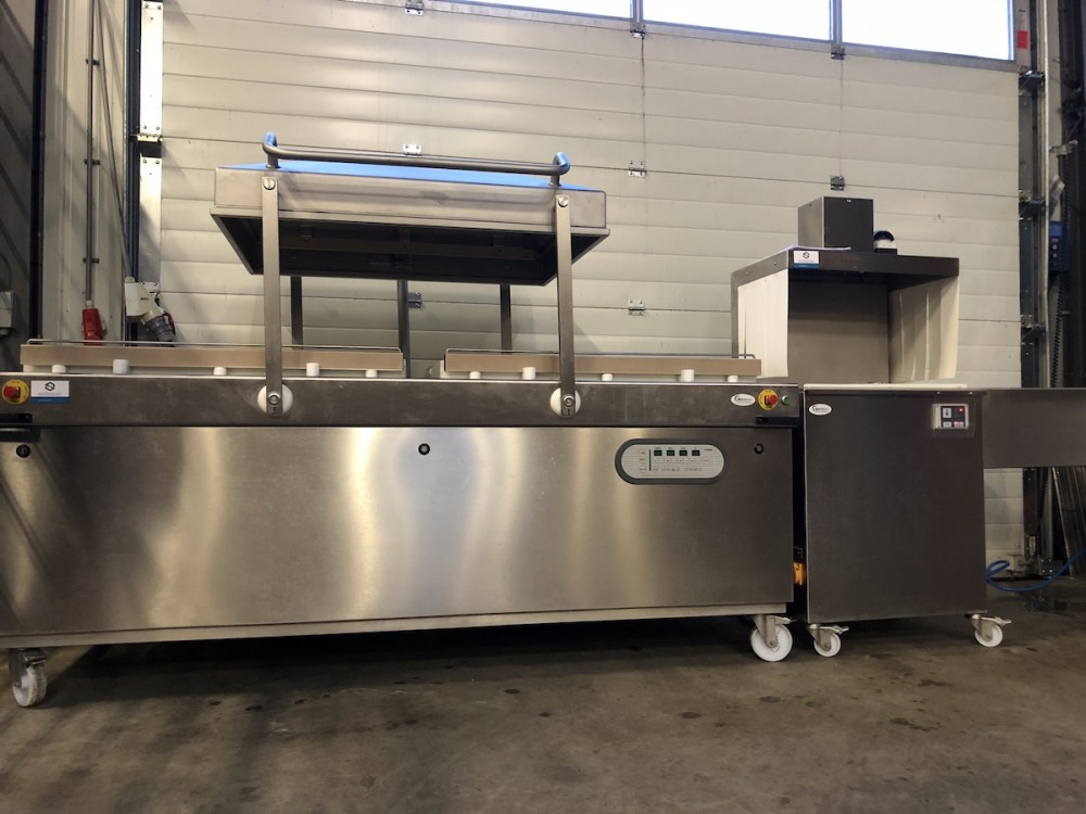 Used Boss double chamber vacuum machine