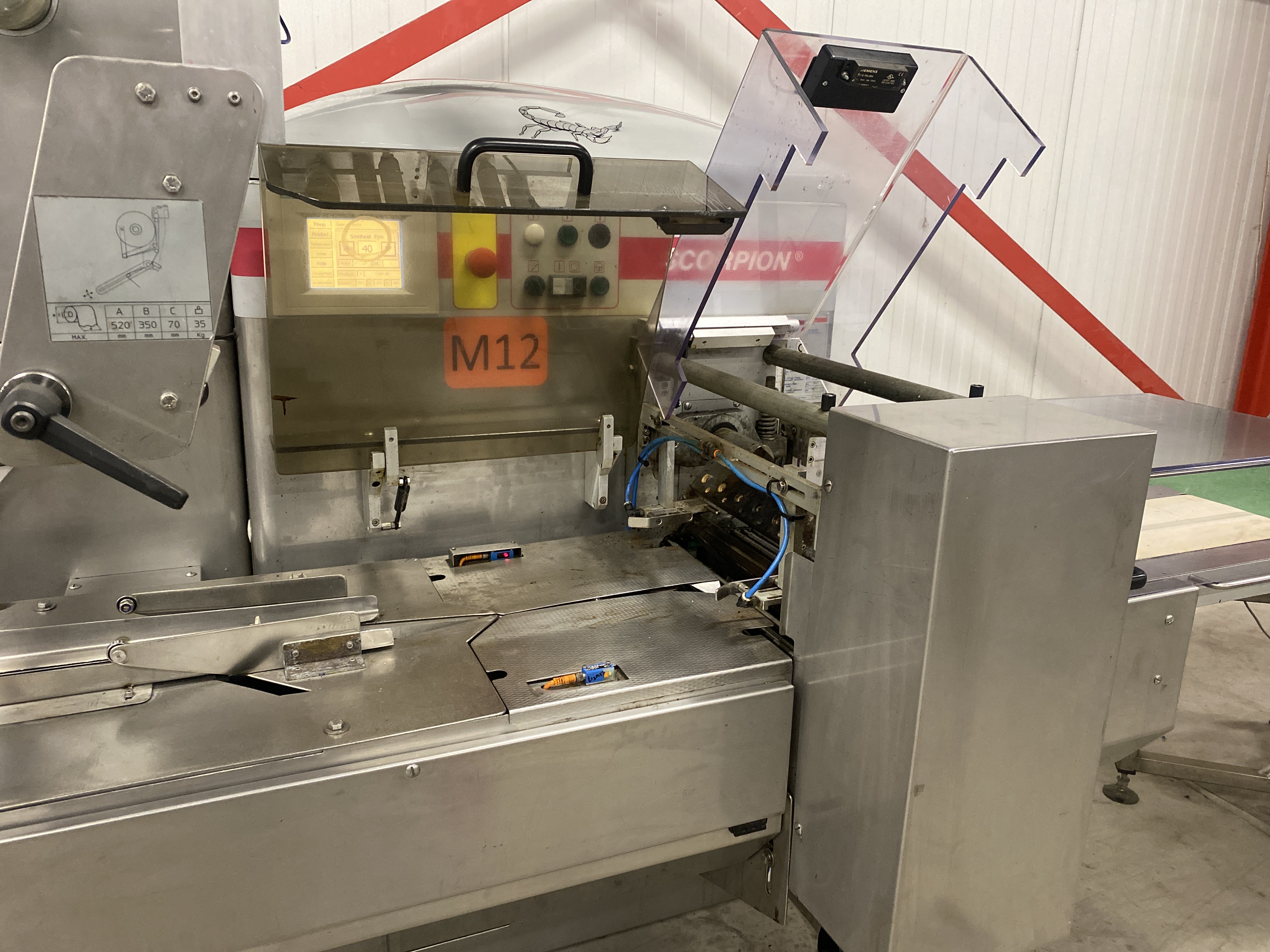 Used Record Scorpion MD flowpacker with Automotion automatic infeed