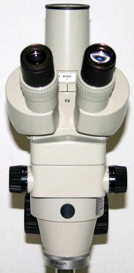 Used NIKON TRINOCULAR STEREOZOOM MICROSCOPE WITH BASE, MODEL SMZ-2T