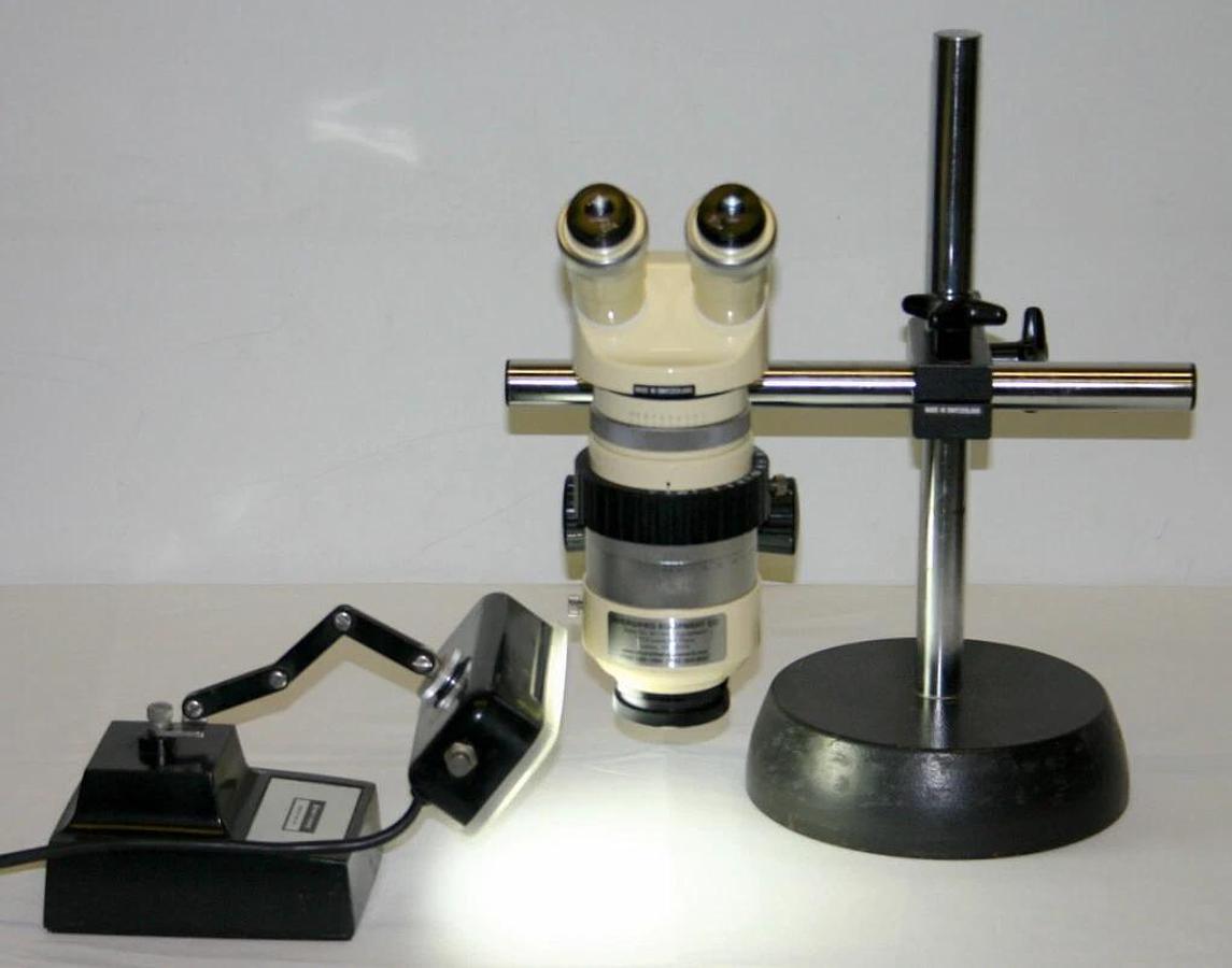 Used WILD HEERBRUGG STEREO MICROSCOPE, MODEL M7A W/ ADJUSTABLE IRIS, STAND & LIGHT