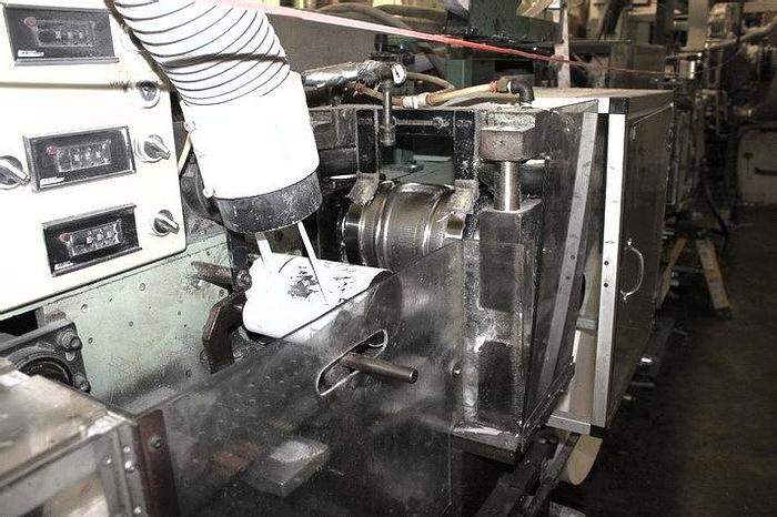 Used RAYNWORTH SANITARY PAD LINE 12" OVERNITE 130 FPM