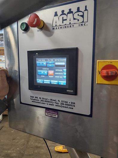 Used Acasi 12 head Pressure Gravity Filler