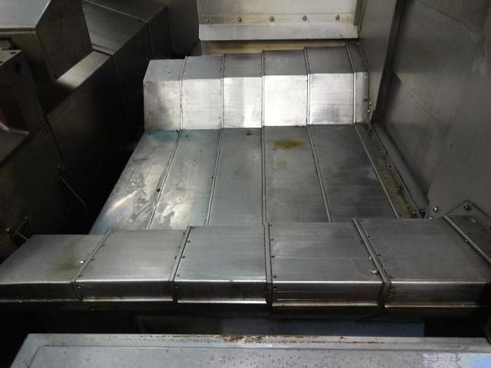 Utilisé Centre d’usinage horizontal bi-palettes Mazak H630 NX