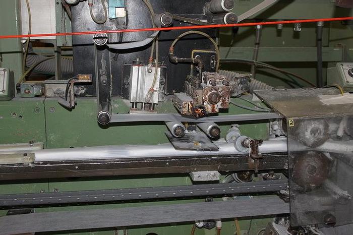 Used RAYNWORTH SANITARY PAD LINE 12" OVERNITE 130 FPM