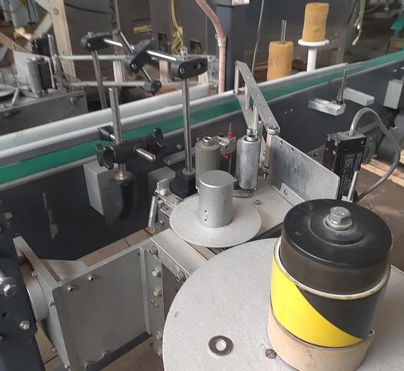 Used Universal Front and Back labeler  2" strippers