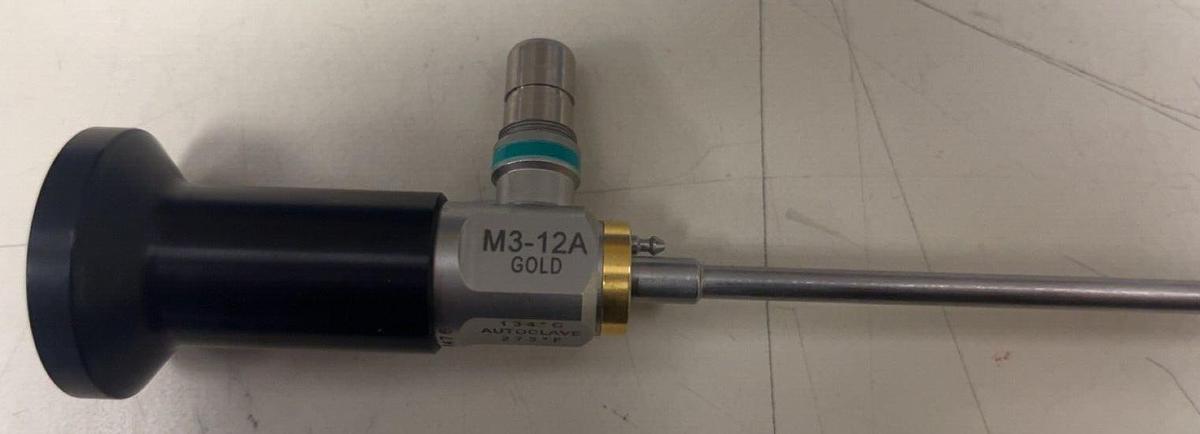 Used ACMI M3-12A Gold autoclavable set 9PC w/Lt Cable, sheaths & Case-Exc. condition.