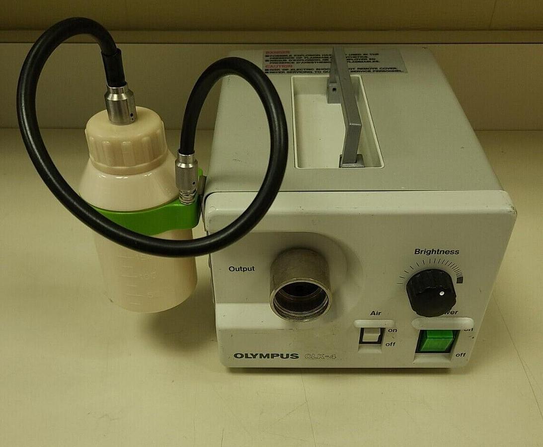 Used Olympus CLK 4 light source and 100/130 water bottle with 90 day warranty