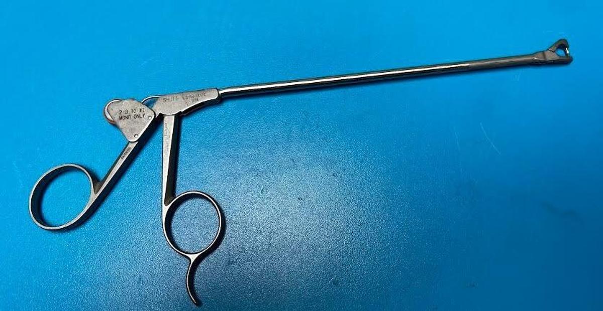 Used Linvatec Shutt MCI 18.10014 Suture Punch, Curved Left with a 90 Day Warranty