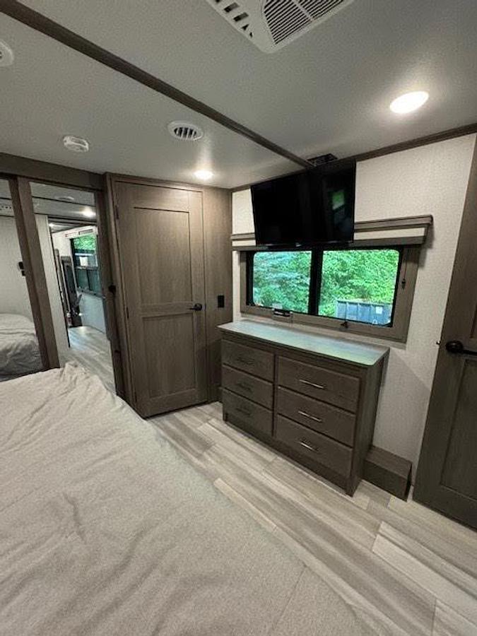 Used 2024 Grand Design Solitude 390RK Fifth Wheel