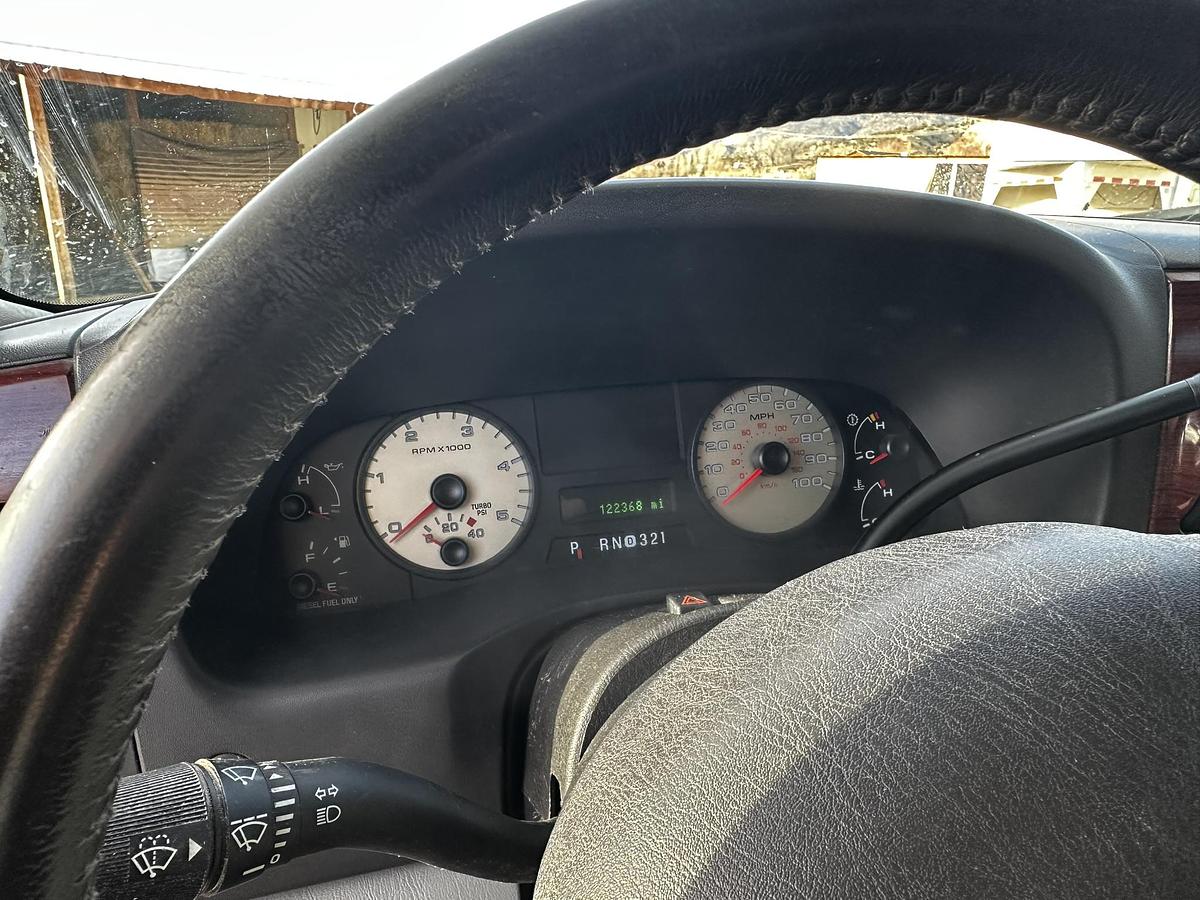 Used 2004 Lance 1161 Cab Over Camper Mounted on a 2005 Ford F350 Lariat