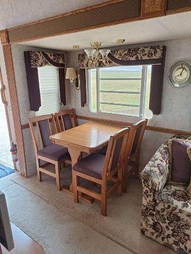 Used 2012 RAM 2500 and 2003 NuWa Hitchhiker Discover America