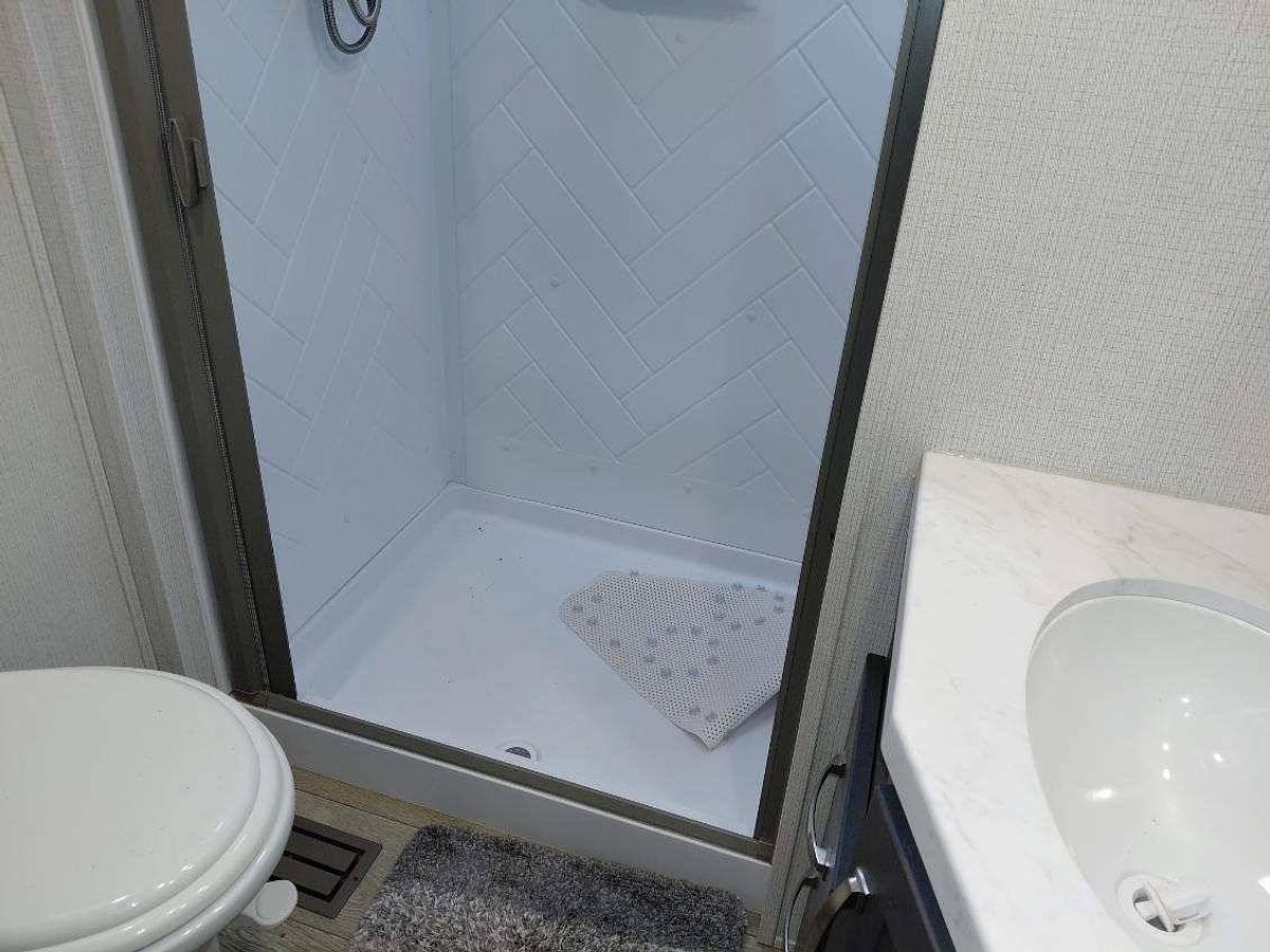 Used 2024 Keystone Cougar 2400RE Fifth Wheel and a 2024 GMC Sierra 2500