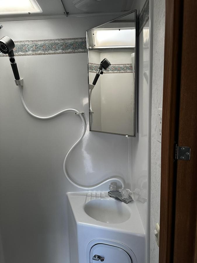 Used 2004 Lance 1161 Cab Over Camper Mounted on a 2005 Ford F350 Lariat