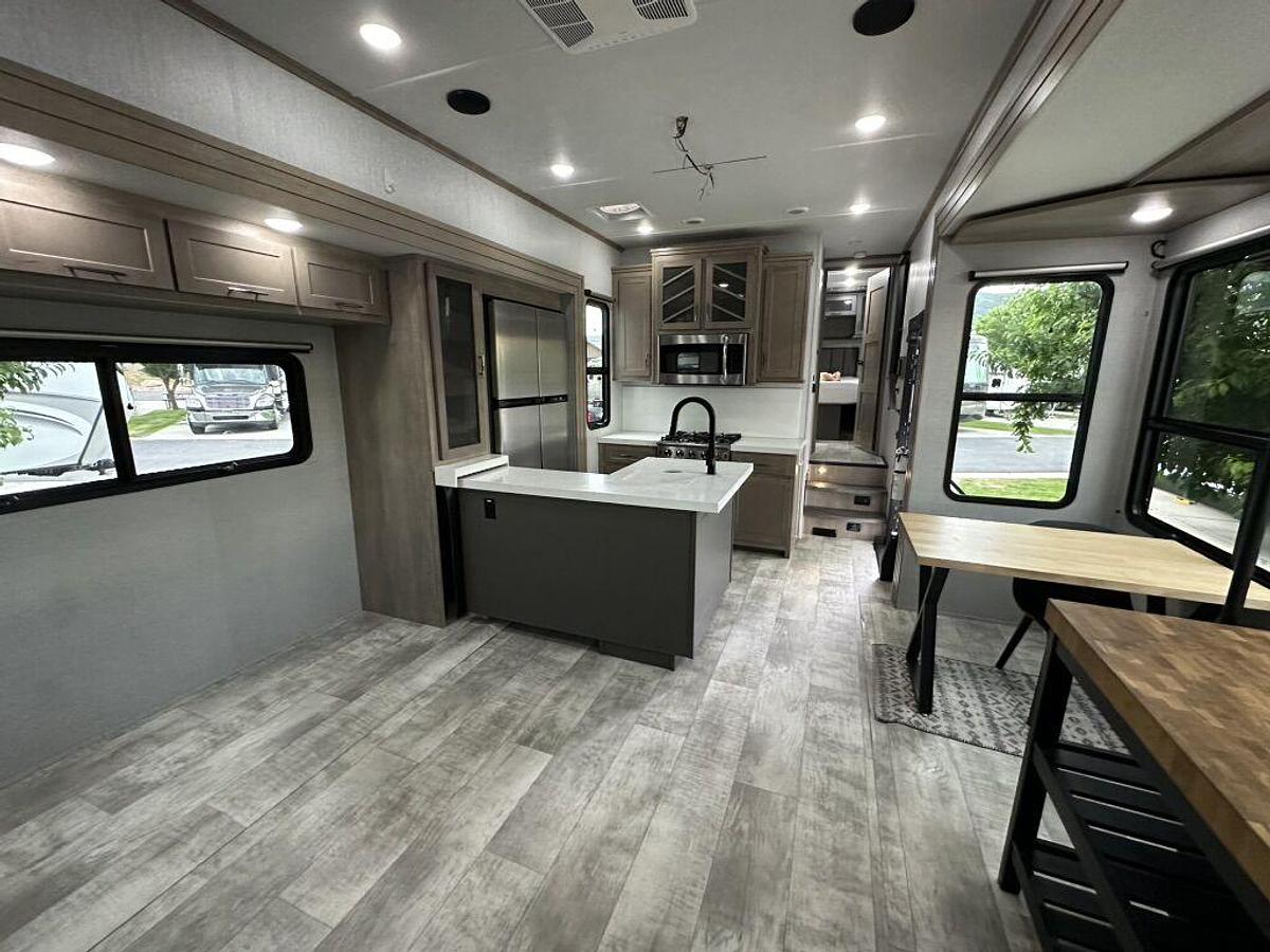 Used 2023 Grand Design Momentum M-395MS Fifth Wheel Toy Hauler