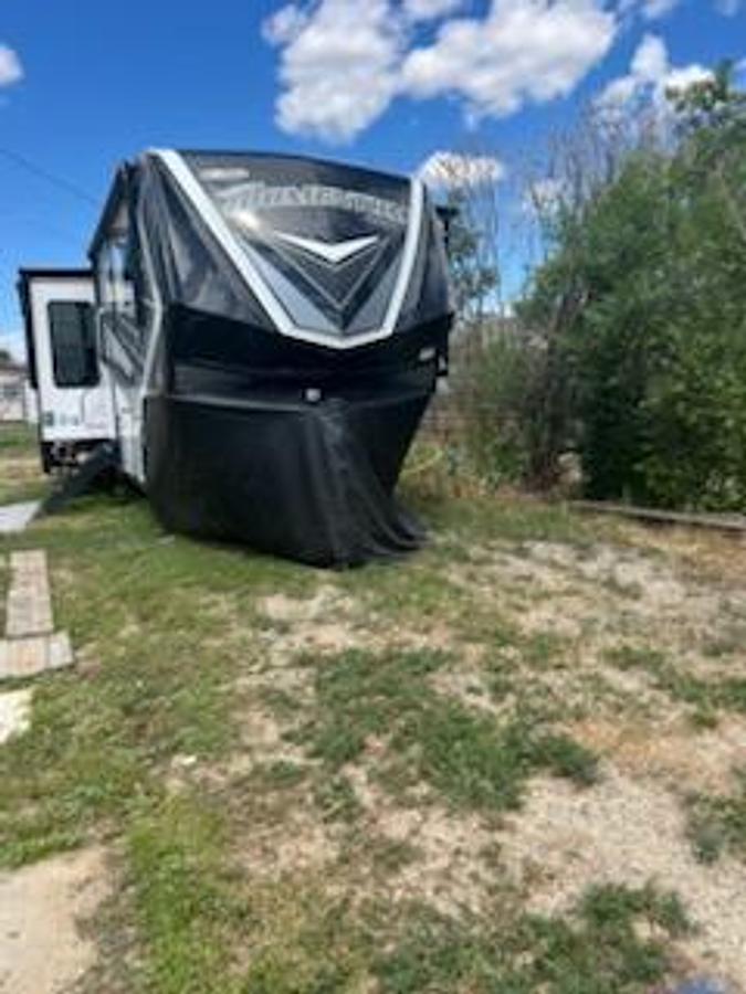 Used 2021 Grand Design Momentum 5th Wheel Toy Hauler