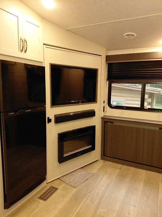 Used 2024 Keystone Cougar 2400RE Fifth Wheel and a 2024 GMC Sierra 2500