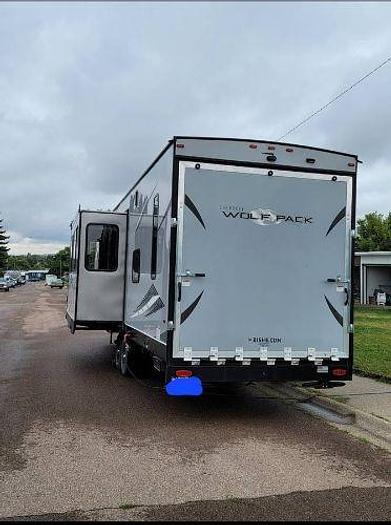 Used 2022 Forest River Cherokee Wolf Pack 315PACK12 and 2019 KTM 250 XC-W