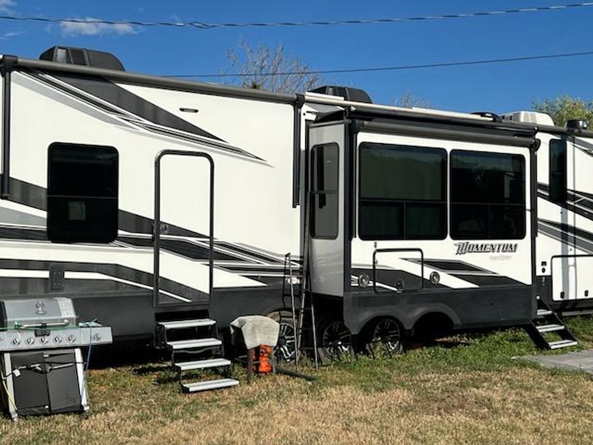 Used 2021 Grand Design Momentum 5th Wheel Toy Hauler